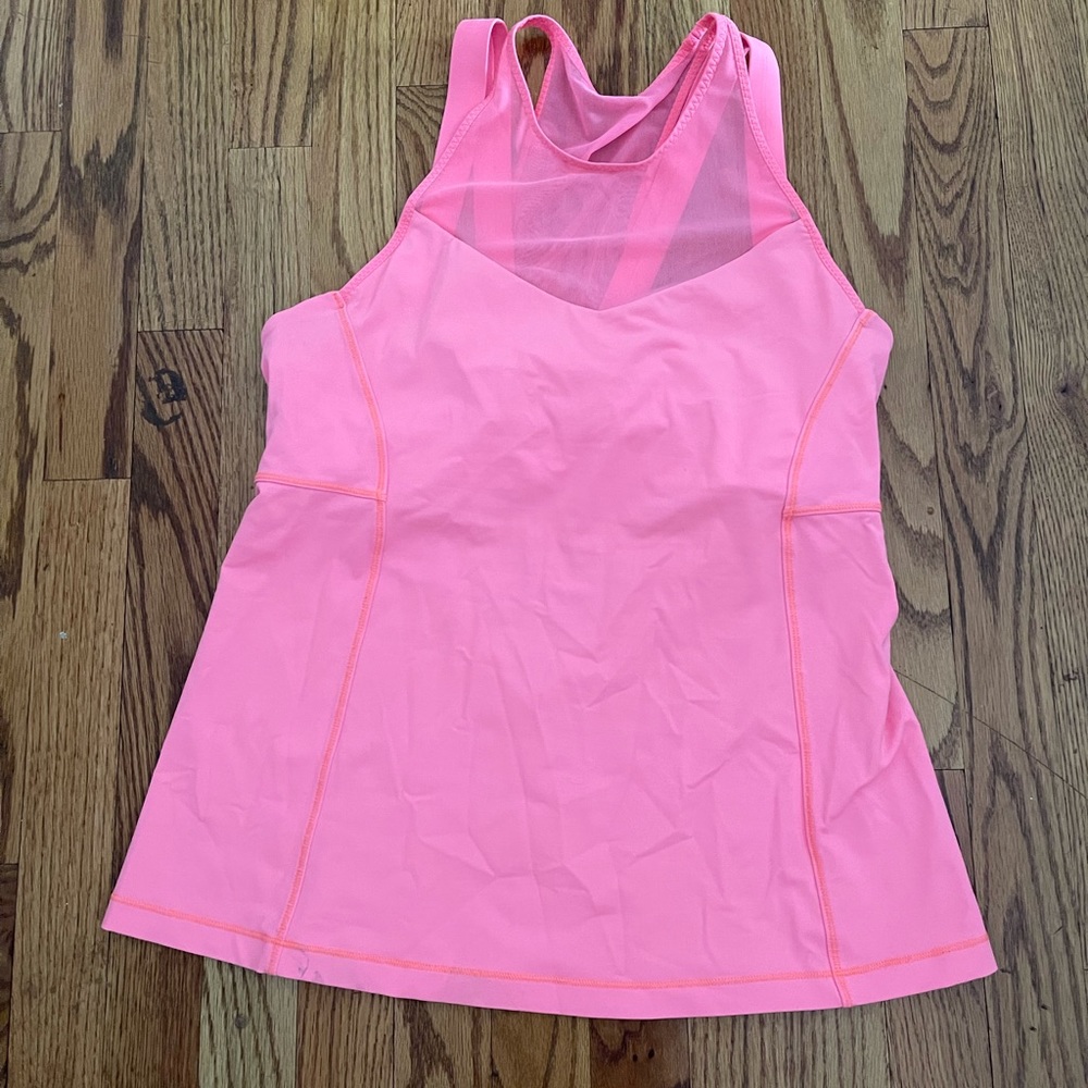 Lululemon NWOT tags. Size 8. Salmon color.